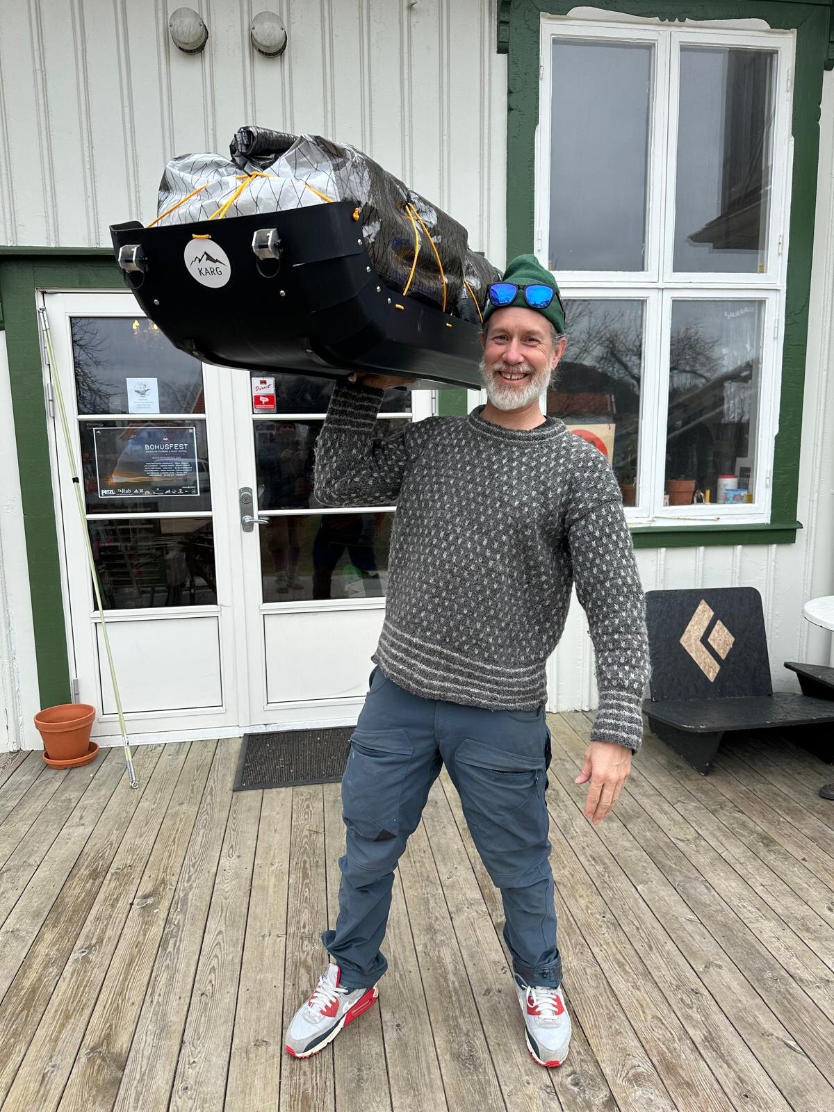 KARG Ski Pulk carried over a shoulder