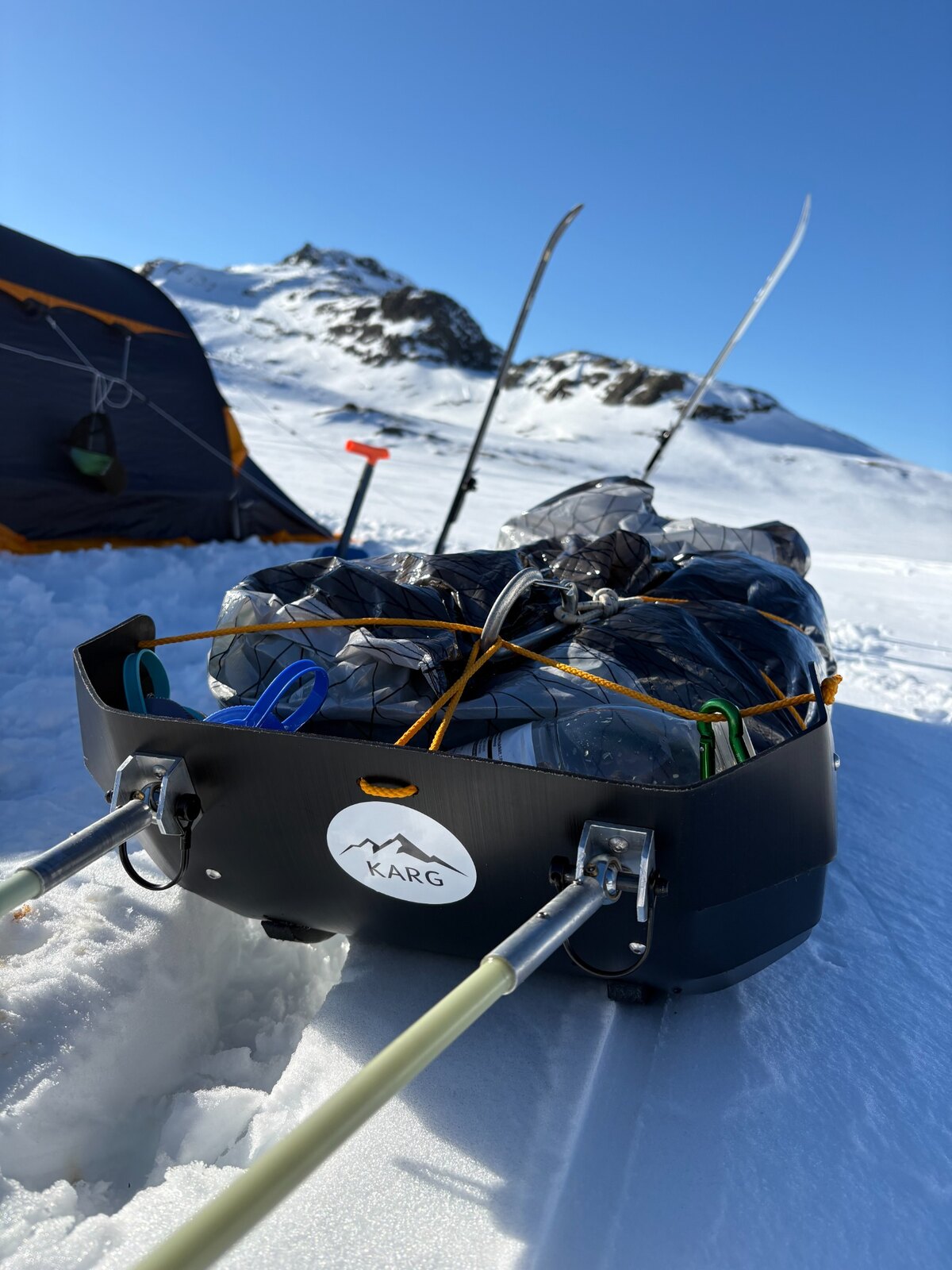 KARG Ski Pulk with load and shafts in snow